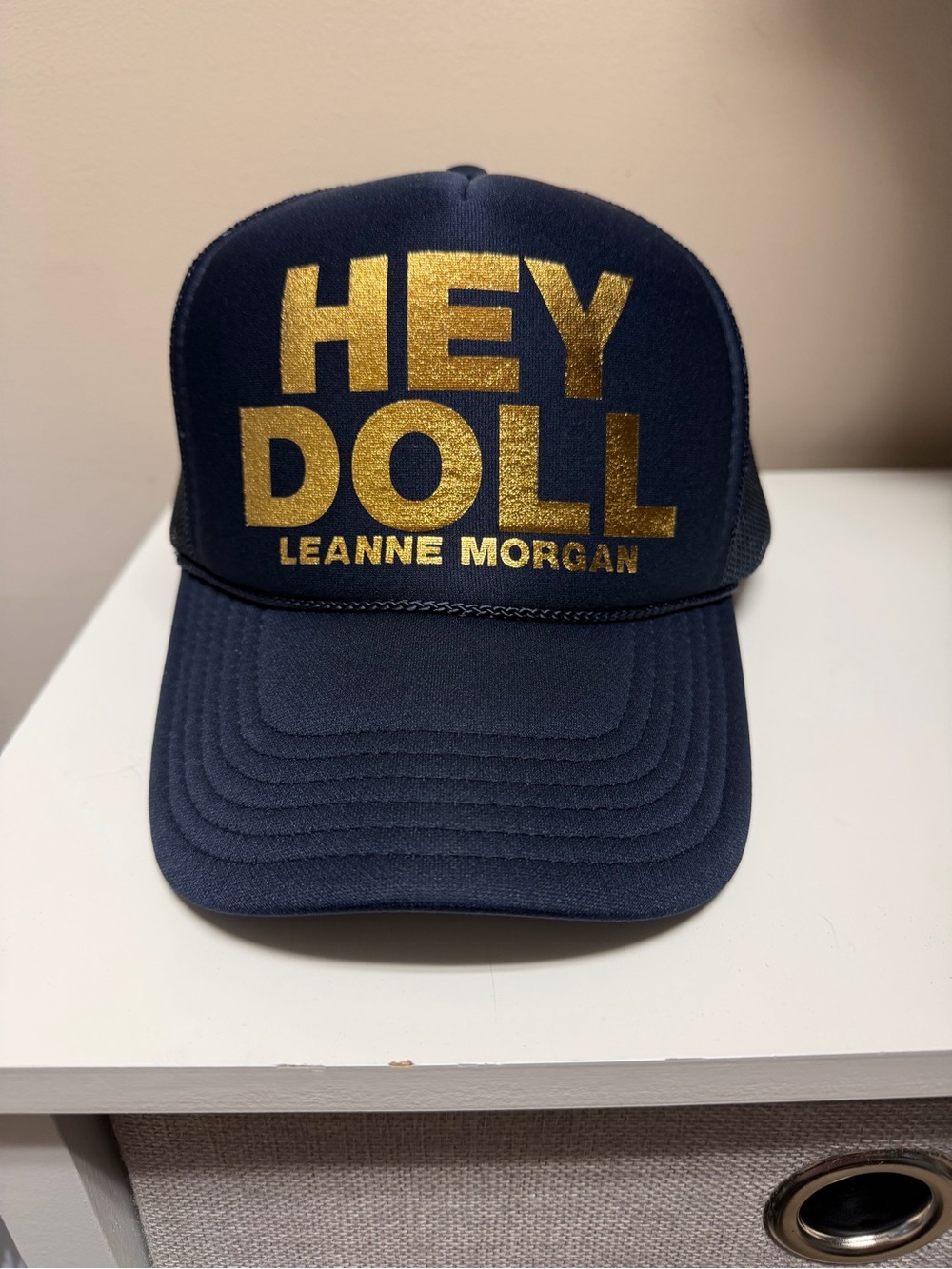 HEY DOLL Trucker Hat with Gold Foil Text
